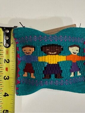 Handwoven Teal Textile Wristlet with Multicolor Folk Figures